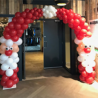 Balloon arch Santa Clauses